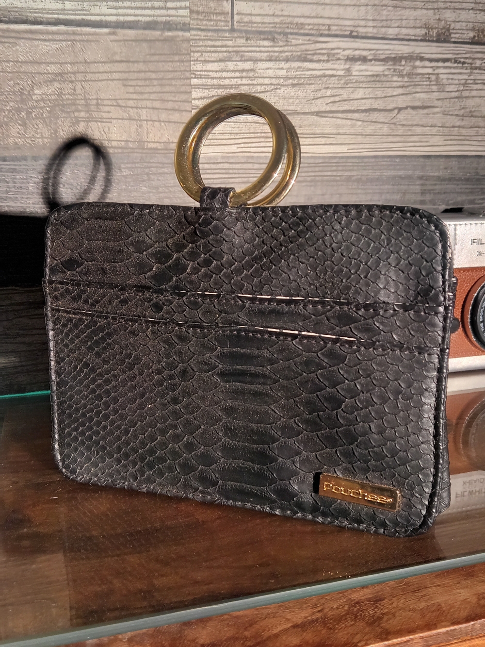 Textured Black Wristlet Clutch with Gold Ring Accent